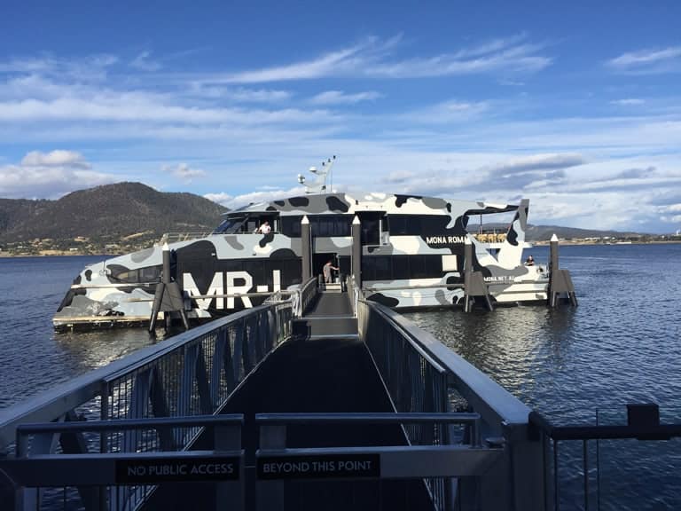 camouflage-painted ferryboat to MONA